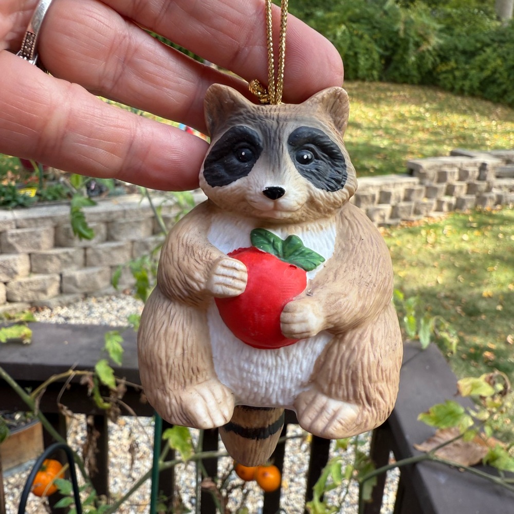 Adorable Raccoon Ornament with Red Apple